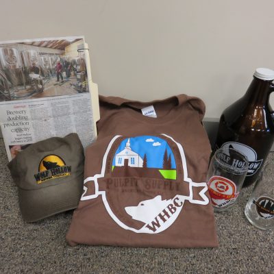 #32 - Wolf Hollow Brewery Set  --  
Contents:
•	Wolf Hollow Baseball Cap
•	Pulpit Supply T-Shirt
•	2 Beer Glasses
•	Beer Jug
•	$40 Gift Card to Wolf Hollow Brewery
•	Newspaper Clipping about Wolf Hollow Brewery
-------
Value:  $95.00
Starting Bid:  $50.00
Bid Increments:  $ 5.00
Current Bid:  $ 50.00
