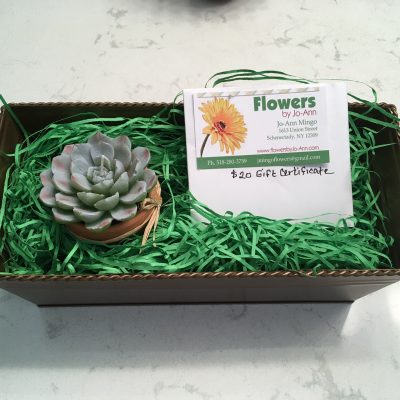 #33  Flowers by Jo-Ann --
$20 Gift Certificate
Hens & Chicks Candle in Terra Cotta Pot
Metal Basket
------------------
Value:  $ 28.00
Starting Bid:  $ 14.00
Bid Increment:  $ 2.00
Current Bid:  $ 14.00